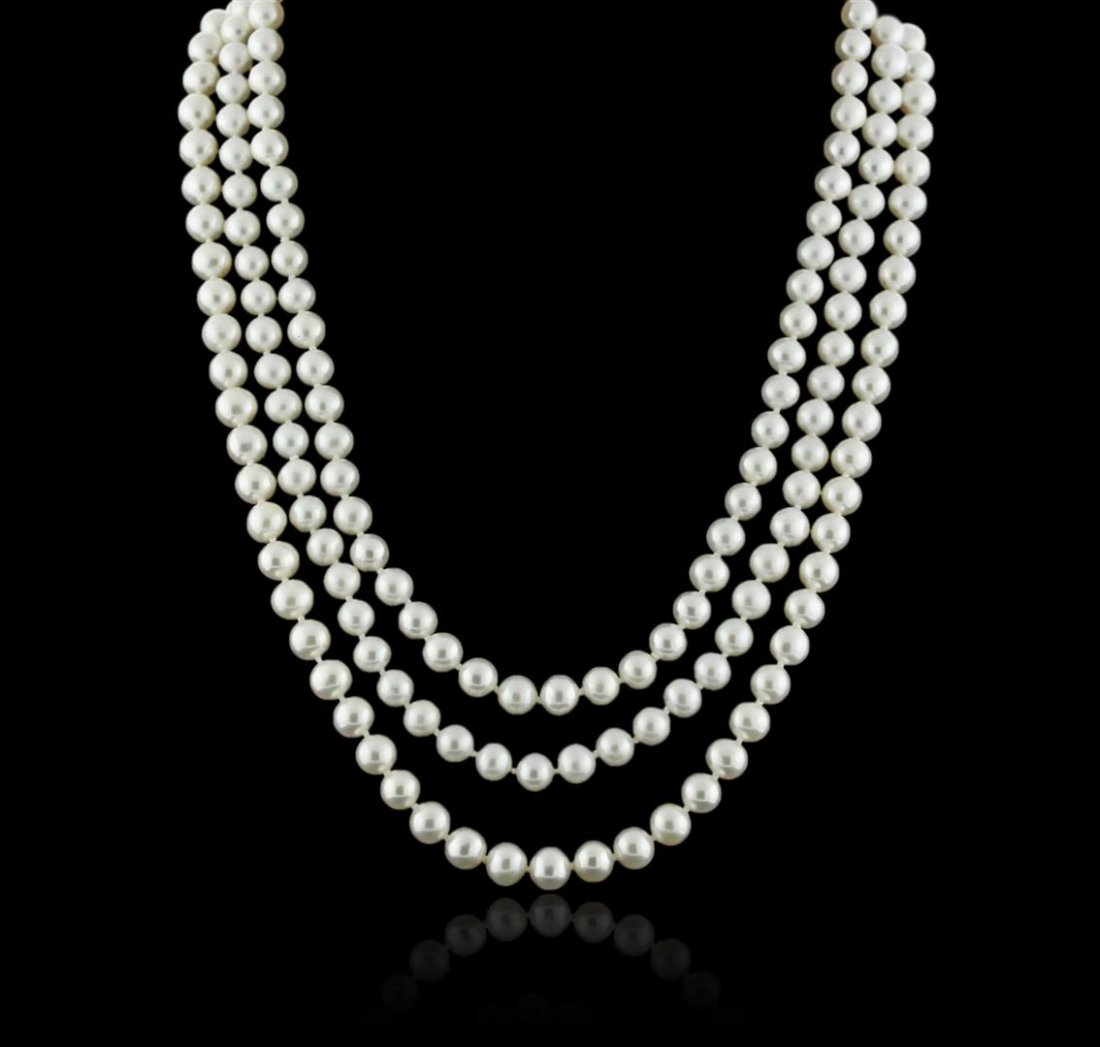 14KT White Gold Pearl and Diamond Necklace: One necklace featuring: 14KT white gold weighing 72.40 grams containing three rows of 6-7mm fresh water pearls and 17 diamonds with a total weight of 0.09ct.