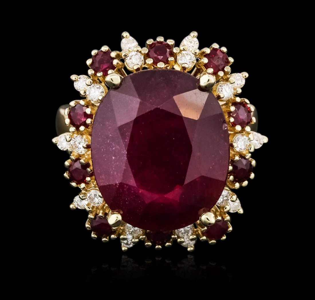 14KT Yellow Gold 13.05ctw Ruby and Diamond Ring: One electronically tested 14KT yellow gold ladies cast ruby and diamond ring with a bright polish finish. Identified with markings of "14K". Condition is new. Containing: One prong set oval modified b