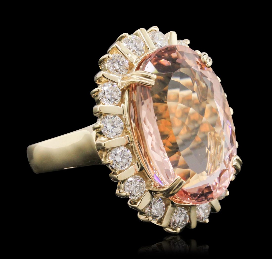 14KT Yellow Gold 15.50ct Morganite and Diamond Ring: One electronically tested 14KT yellow gold Ladies combination cast & assembled ring with a bright polish finish. Condition is new. Identified with markings of "14K". Containing: One prong set oval mod