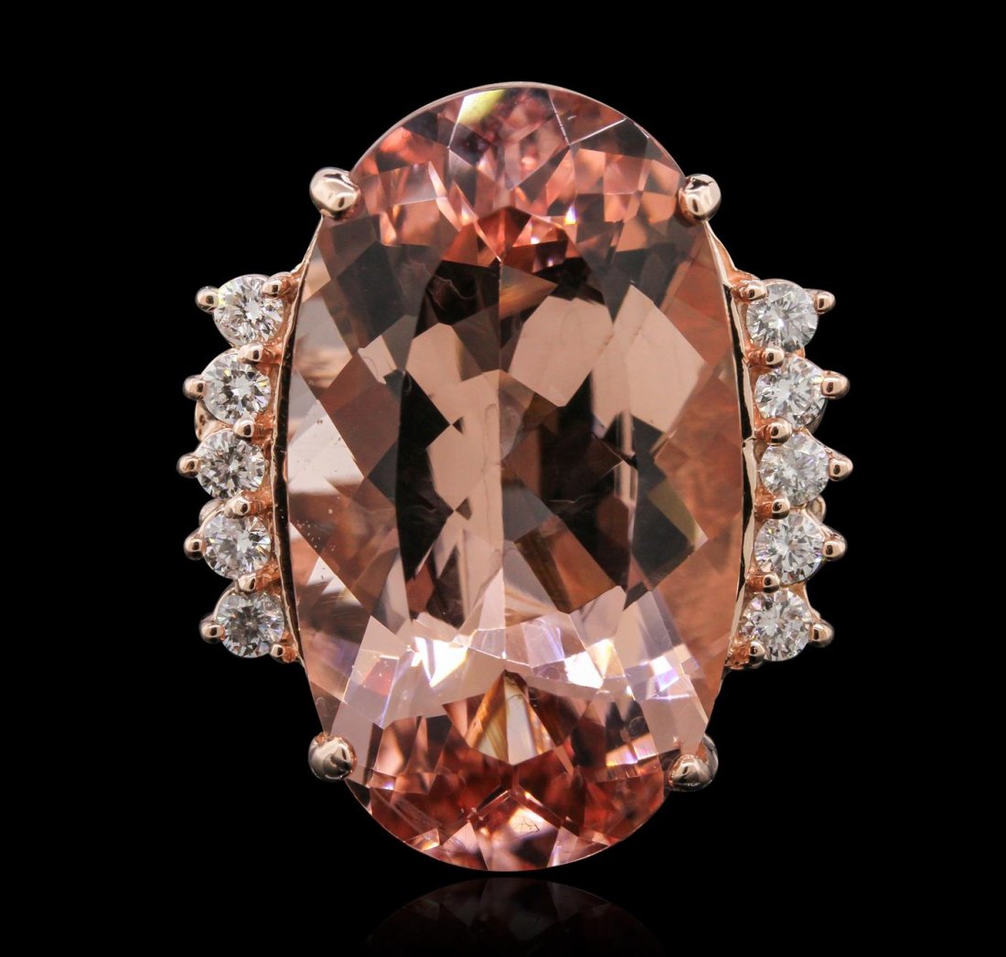 14KT Rose Gold 23.97ct GIA Certified Morganite and: One electronically tested 14KT rose gold Ladies combination cast & assembled ring with a bright polish finish. Condition is new. Identified with markings of "K14". Containing: One prong set oval modif