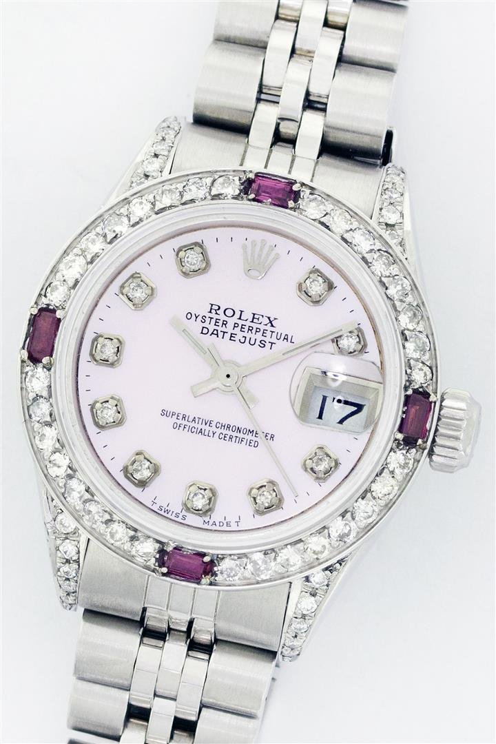 Ladies Rolex Stainless Steel Diamond and Ruby DateJust: One Ladies Rolex Datejust Polished Bright with Satin Finish, Serviced & Electronically Tested, Stainless Steel Case With Diamond Lugs, Clarity: SI-VS, Color: G to H Case Size:26mm, Stainless Steel Cro