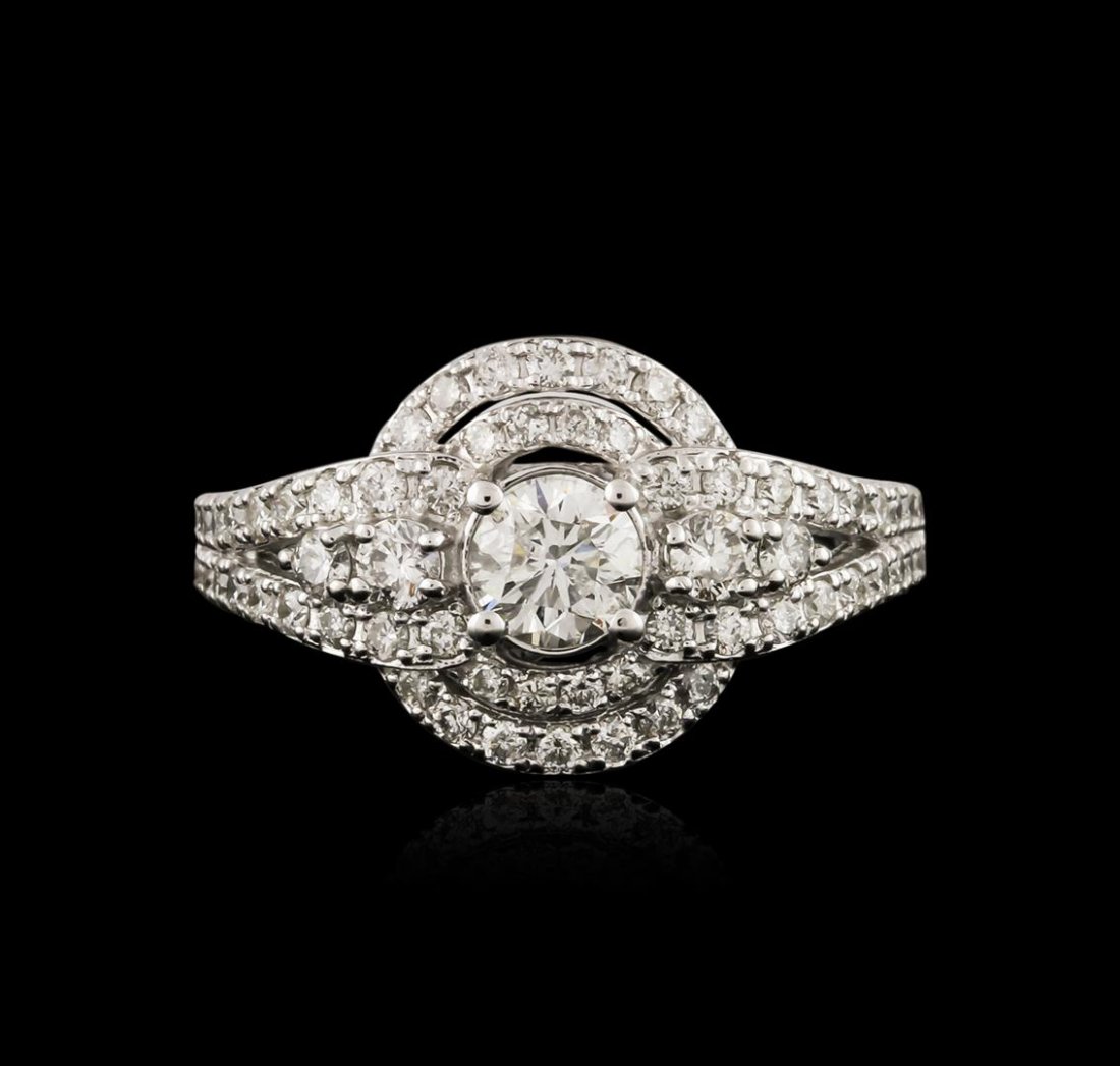 14KT White Gold 1.16ctw Diamond Ring: One electronically tested 14KT white gold ladies cast diamond engagement ring with a bright polish finish. Identified with markings of "14K". Condition is new. Containing: One prong set round brillian