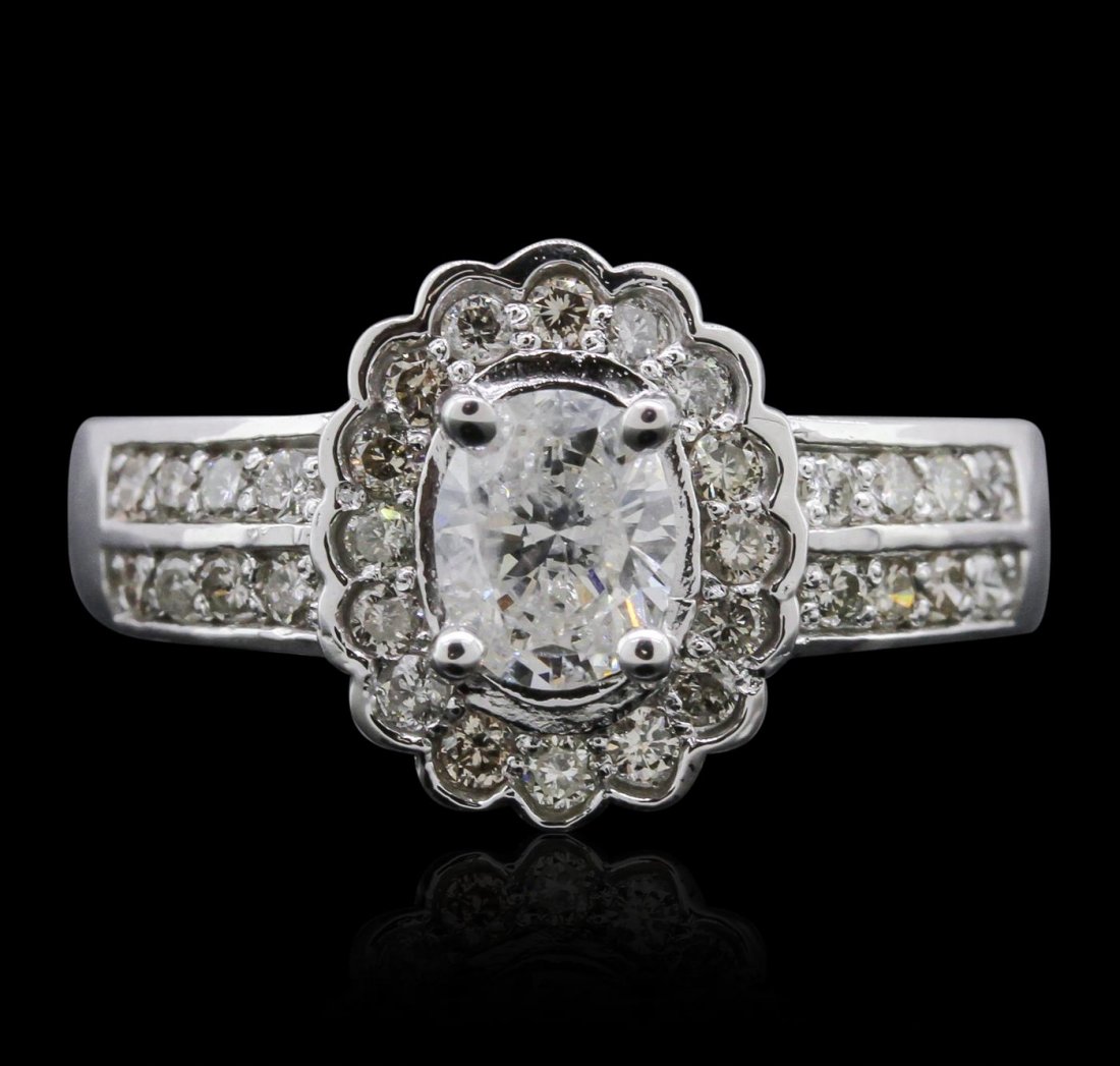 14KT White Gold 1.32ctw Diamond Ring: One electronically tested 14KT white gold ladies cast diamond unity ring with a bright polish finish. Condition is new, good workmanship. The featured diamond is set within a stylized diamond bezel su