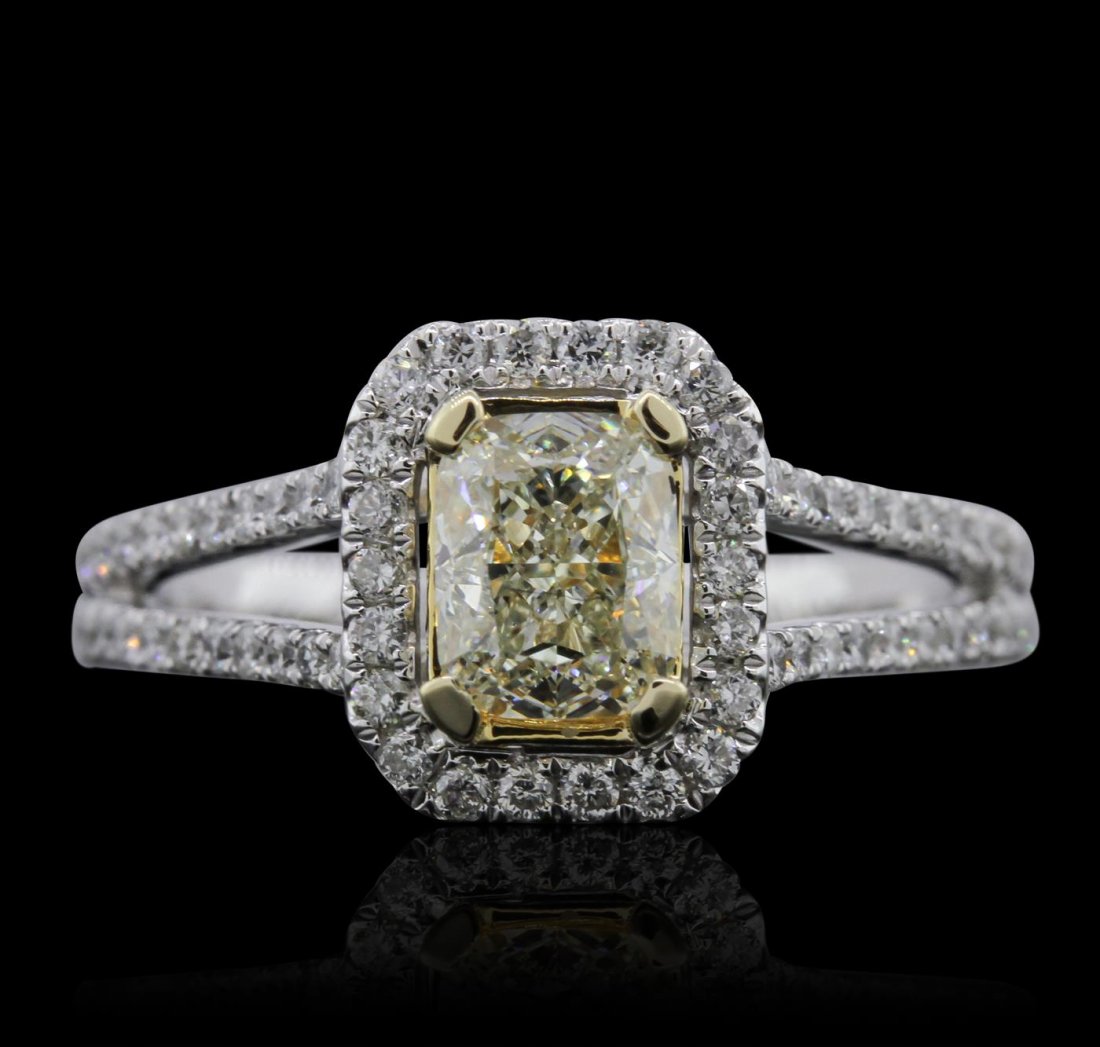 14KT White Gold 1.05ct VS2/Light Yellow Diamond Ring: One electronically tested 14KT white gold ladies cast diamond unity ring. Condition is new, good workmanship. The featured diamond is set within a diamond bezel supported by a diamond set under galler
