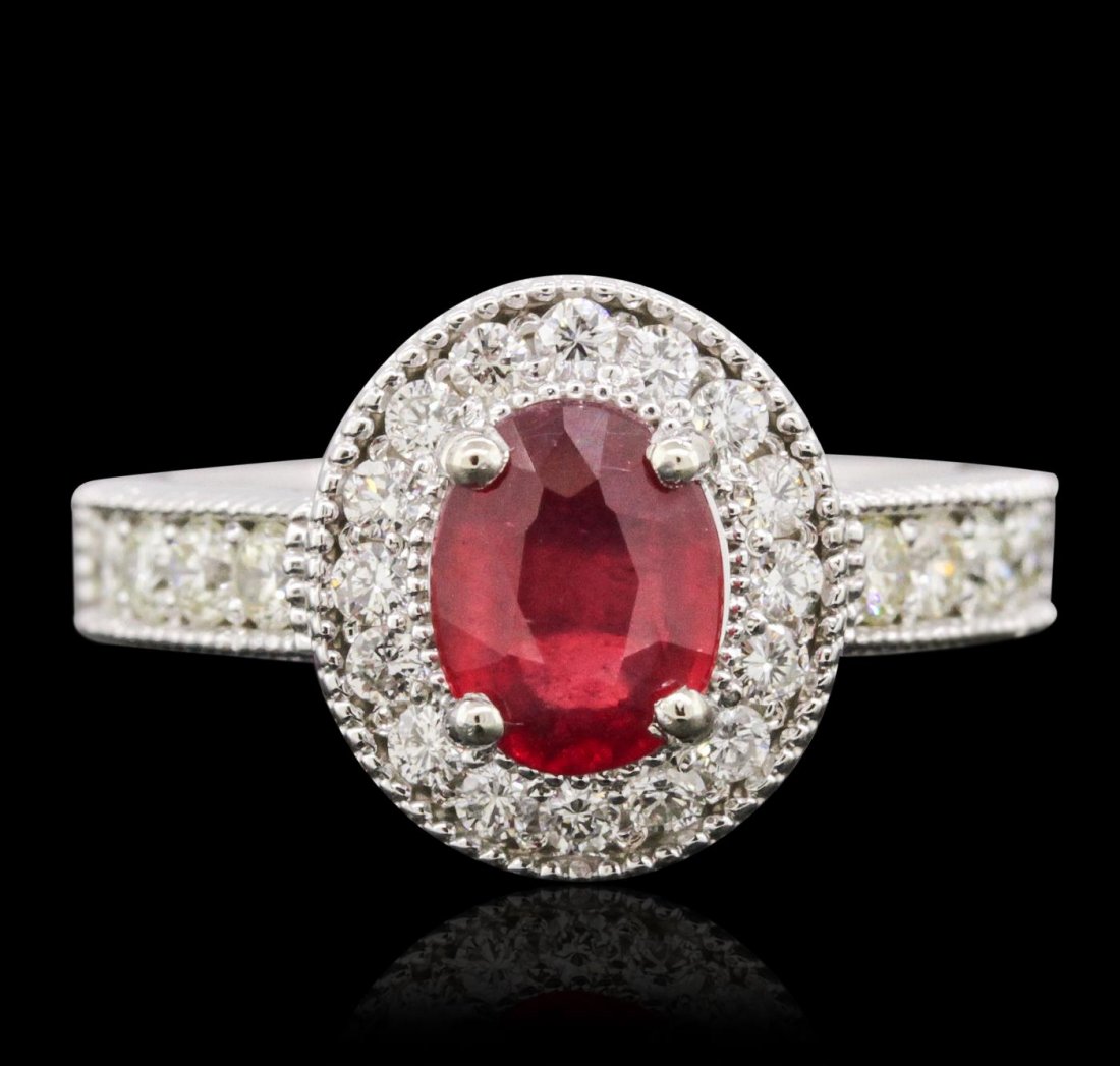 14KT White Gold 1.83ct Ruby and Diamond Ring: One electronically tested 14KT white gold ladies combination cast & assembled ring with a bright polish finish. Condition is new. Identified with markings of "14K". Containing: One prong set oval modi
