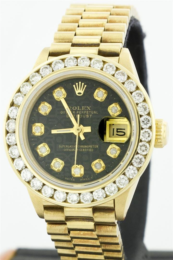 Ladies Rolex President 18KT Gold 2.50ctw Diamond: One Ladies Rolex President Polished, Serviced & Electronically Tested, Yellow Gold Case: 26mm, Yellow Gold Crown, Custom Bezel: 18K Yellow Gold Channel Set Diamond Bezel, Diamond Count: 32 Diamonds To