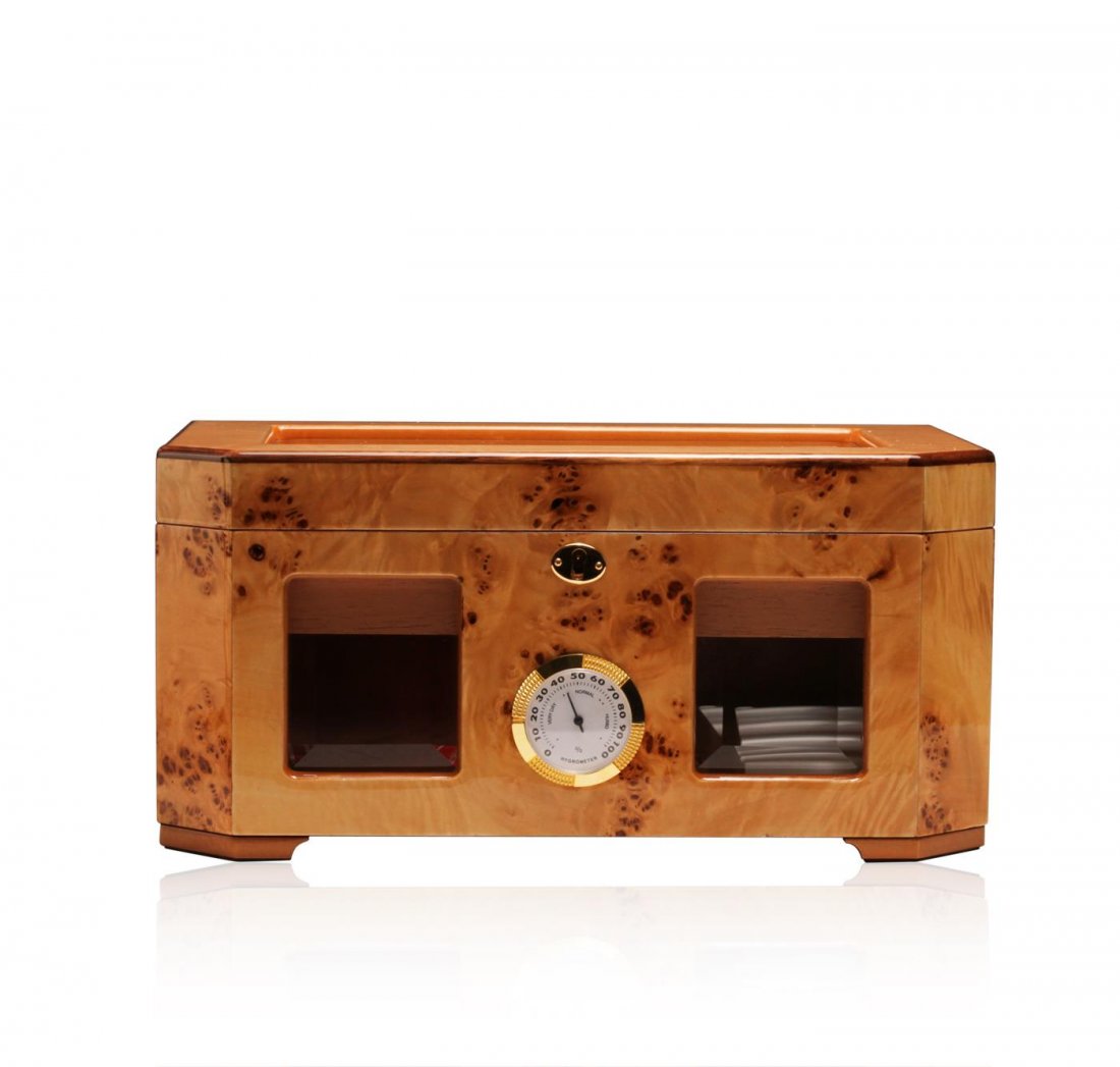 Maple Wood Deluxe Cigar Humidor: One deluxe cigar humidor featuring a glossy maple wood exterior lined with premium Spanish cedar, glass top/front windows, and solid brass hardware including gold plated hidden quadrant piano hinges a
