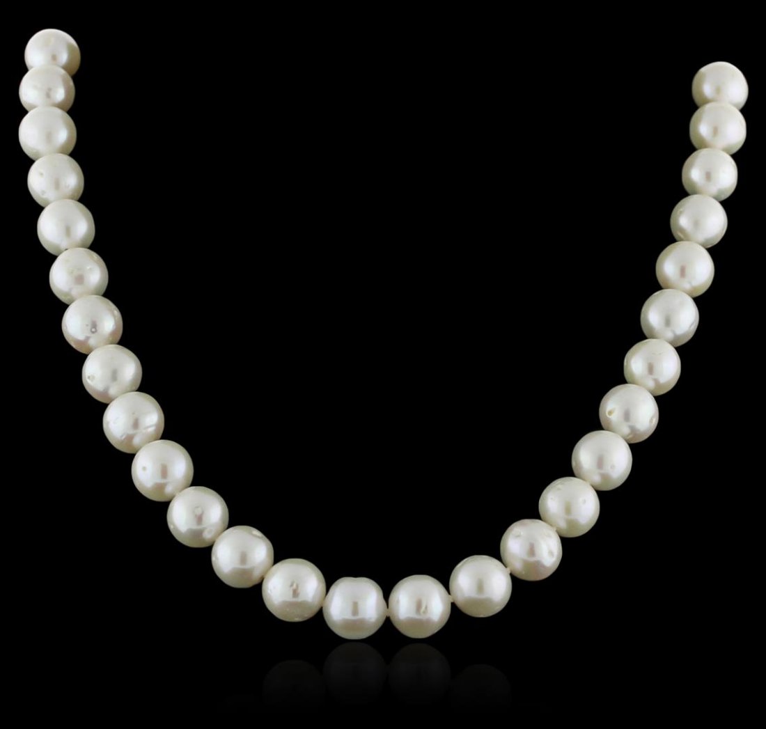 14KT White Gold Pearl Necklace: One necklace featuring: 14KT white gold weighing 64.92 grams containing 38 fresh water pearls measuring 11mm.