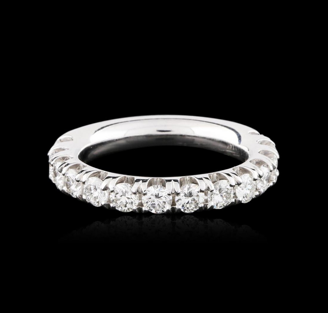 14KT White Gold 1.38ctw Diamond Ring: One electronically tested 14KT white gold ladies cast wedding ring with a bright polish finish. Identified with markings of "14K". Condition is new. Containing: Fourteen prong set round brilliant cut 
