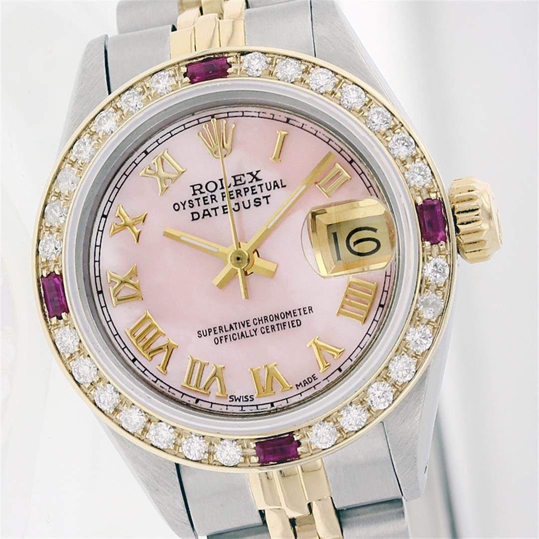 Rolex Two-Tone Diamond and Ruby DateJust Ladies Watch: One Ladies Two Tone Rolex Datejust Polished, Serviced & Electronically Tested, 14K Yellow Gold & Stainless Steel Case: 26mm, 14K Yellow Gold Crown, Custom Bezel: 18K Yellow Gold Ruby Beadset Diamond B