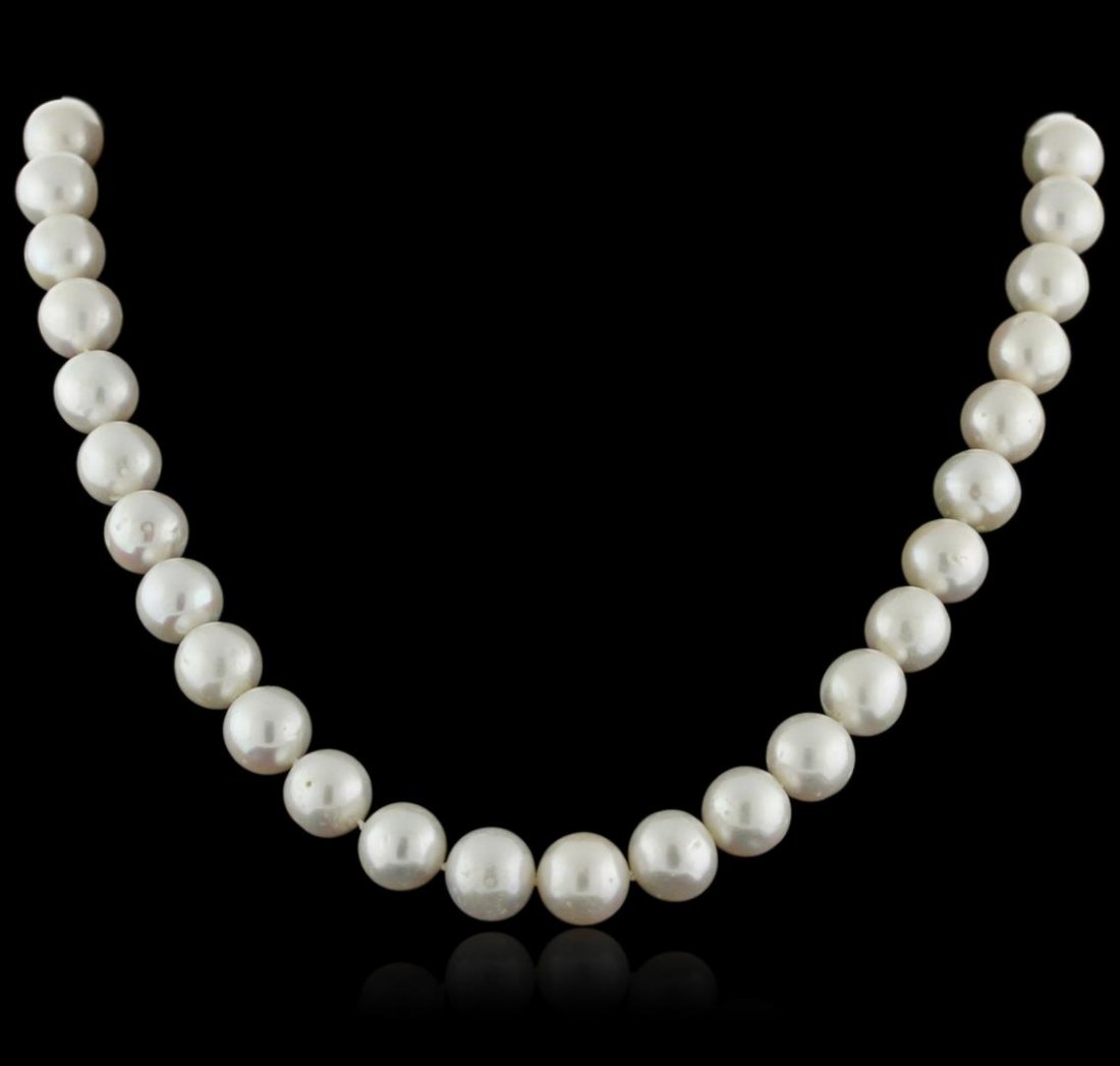 14KT White Gold Pearl Necklace: One necklace featuring: 14KT white gold weighing 66.87 grams containing 38 fresh water pearls measuring 11mm.