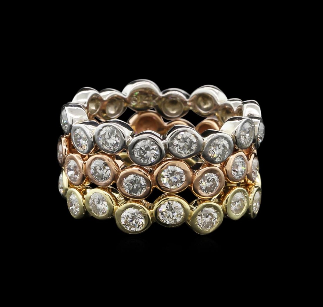 1.42ctw Diamond Stackable Rings - 14KT Tri Color Gold: One set electronically tested 14KT white, yellow and rose gold ladies cast stackable diamond rings. Each ring is completed by a three millimeter wide band. Bright polish finish. Identified with markin