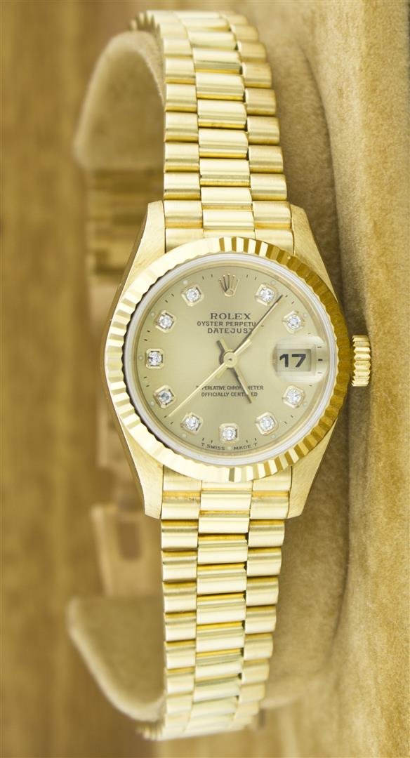Rolex President 18KT Gold Diamond DateJust Ladies Watch: One Ladies Rolex President Polished, Serviced & Electronically Tested, Yellow Gold Case: 26mm, Yellow Gold Crown, Custom Bezel: 18K Yellow Gold Fluted Bezel. Custom Crystal: Synthetic Sapphire Cyclops