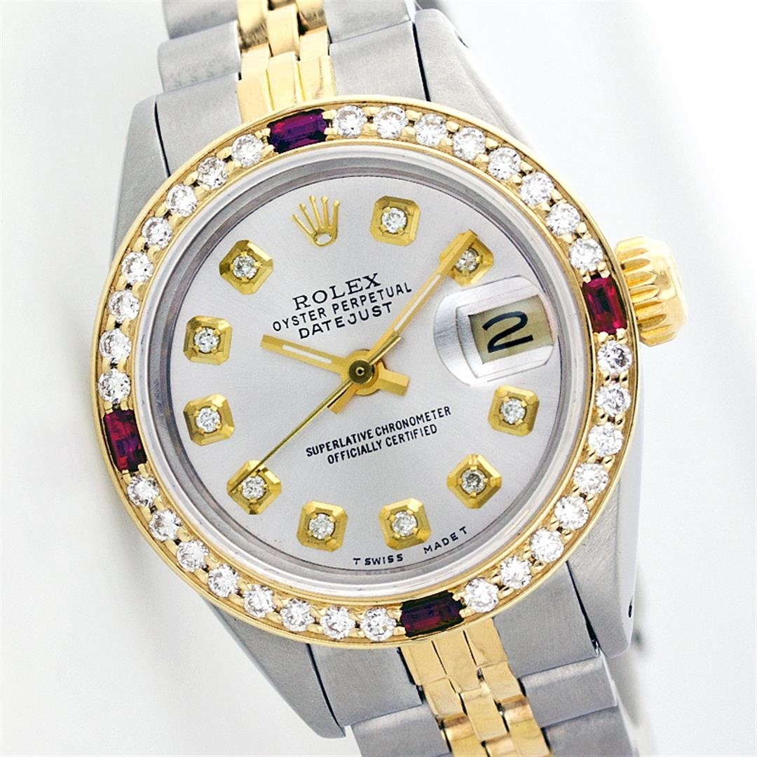 Rolex Two-Tone Diamond and Ruby DateJust Ladies Watch: One Ladies Two Tone Rolex Datejust Polished, Serviced & Electronically Tested, 14K Yellow Gold & Stainless Steel Case:26mm, 14K Yellow Gold Crown, Custom Bezel: 18K Yellow Gold Ruby Beadset Diamond Be