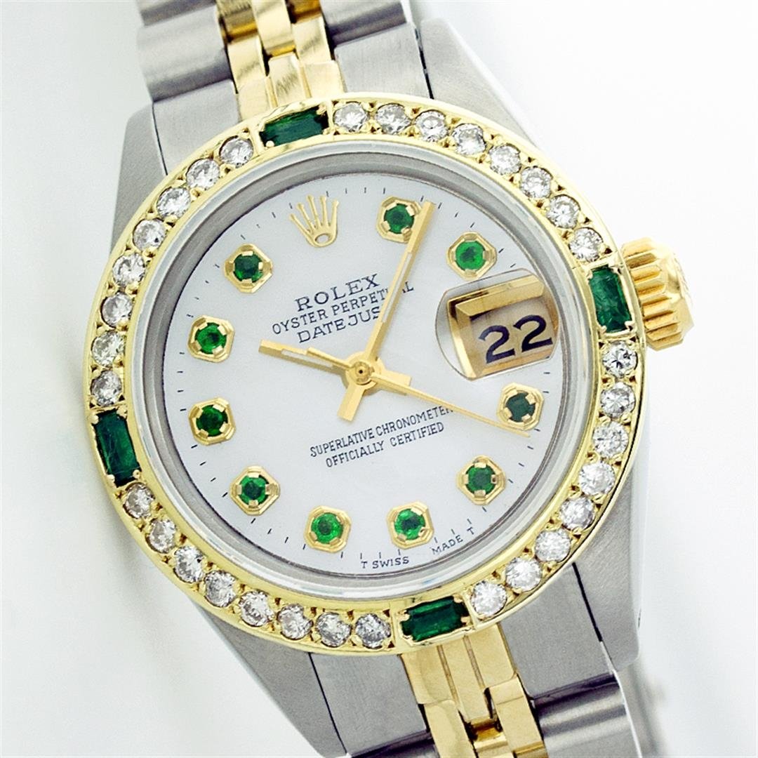Rolex Two-Tone Diamond and Emerald DateJust Ladies: One Ladies Two Tone Rolex Datejust Polished, Serviced & Electronically Tested, 14K Yellow Gold & Stainless Steel Case:26mm, 14K Yellow Gold Crown, Custom Bezel: 18K Yellow Gold Emerald Beadset Diamond