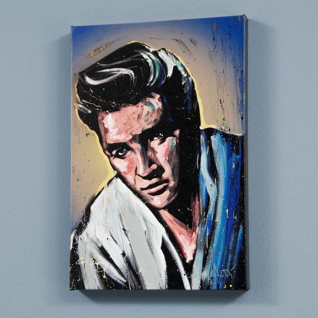 Elvis Presley (Blue Suede) by David Garibaldi: Combining his passions for music and art, David Garibaldi creates stunning visual poetry. "Elvis Presley (Blue Suede)" is a limited edition giclee on stretched canvas, numbered and bearing the artist'