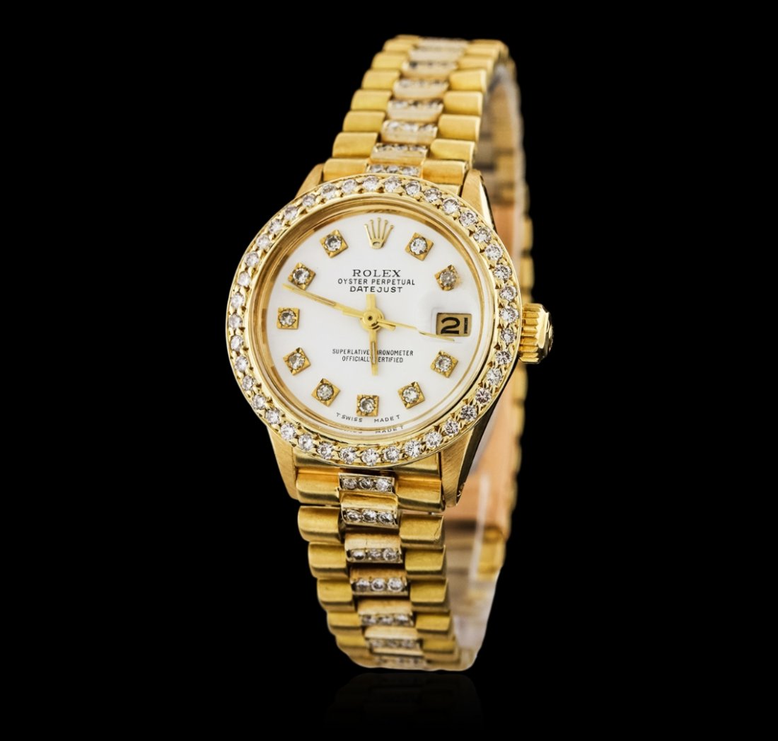 Rolex 18KT Yellow Gold 1.50ctw Diamond DateJust Ladies: One ladies, hand crafted & machine milled Rolex Lady President, the DateJust model wristwatch electronically tested 18KT yellow gold, Case: 25mm oyster, Crown: twinlock with logo, Custom Bezel: diamon