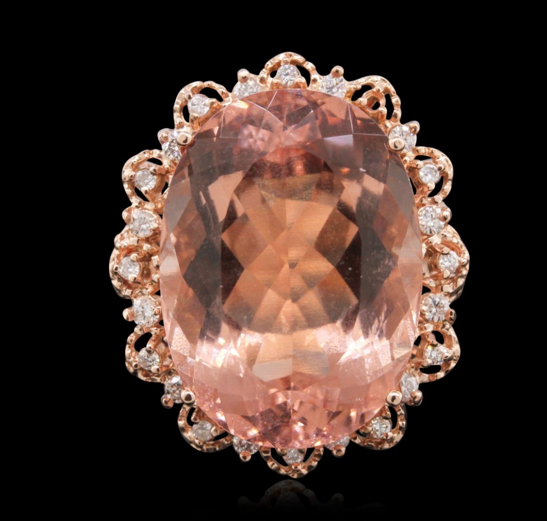 14KT Rose Gold 24.00ct Morganite and Diamond Ring: One electronically tested 14KT rose gold Ladies combination cast & assembled ring with a bright polish finish. Condition is new. Identified with markings of "K14". Containing: One prong set oval modif