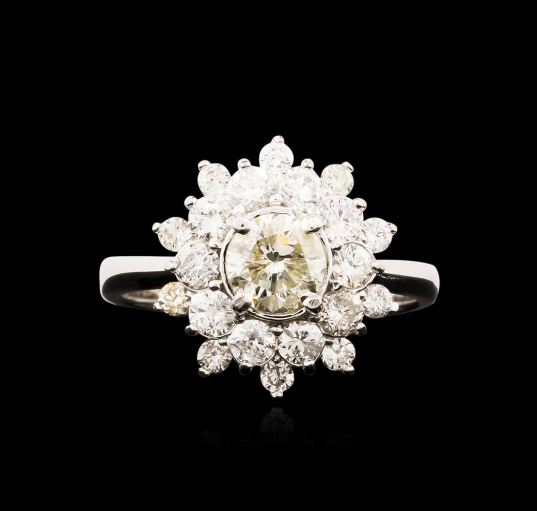 14KT White Gold 1.48ctw Diamond Ring: One electronically tested 14KT white gold ladies cast diamond engagement ring with a bright polish finish. Identified with markings of "14K". Condition is new. Containing: One prong set round brillian