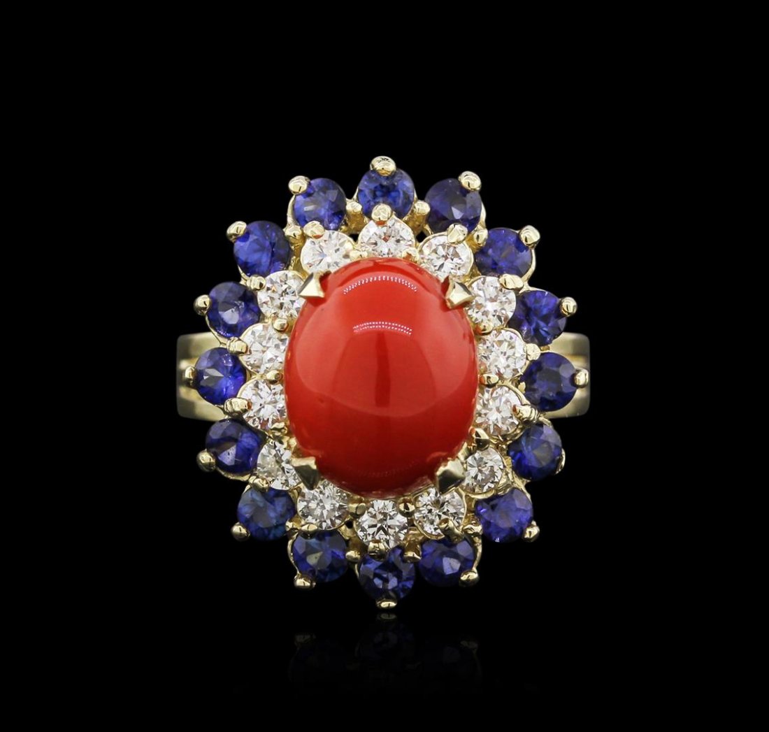 14KT White Gold 3.70ct Coral, Sapphire and Diamond Ring: One electronically tested 14KT white gold ladies cast coral, sapphire and diamond ring with a bright polish finish. Identified with markings of "14K". Condition is new. Containing: One prong set oval 