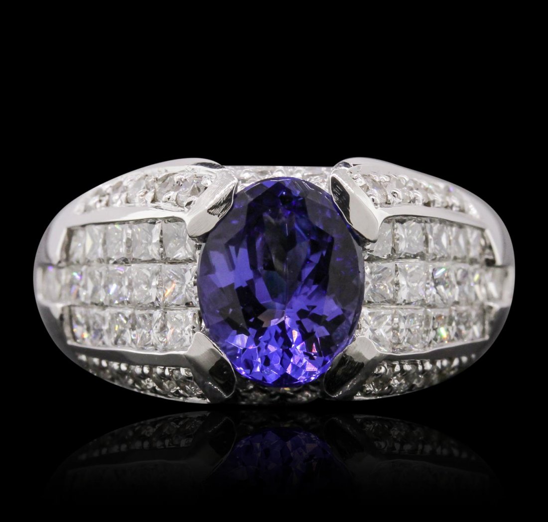 14KT White Gold 2.63ct Tanzanite and Diamond Ring: One electronically tested 14KT white gold Ladies combination cast & assembled ring with a bright polish finish. Condition is new. Identified with markings of "14K". Containing: One prong set oval modi