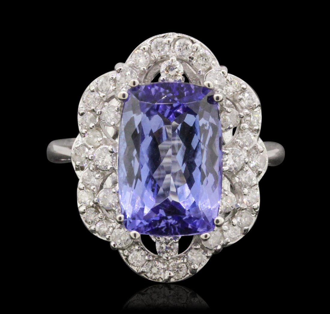 14KT White Gold 5.00ct Tanzanite and Diamond Ring: One electronically tested 14KT white gold ladies combination cast & assembled ring with a bright polish finish. Condition is new. Identified with markings of "14K". Containing: One prong set rectangul