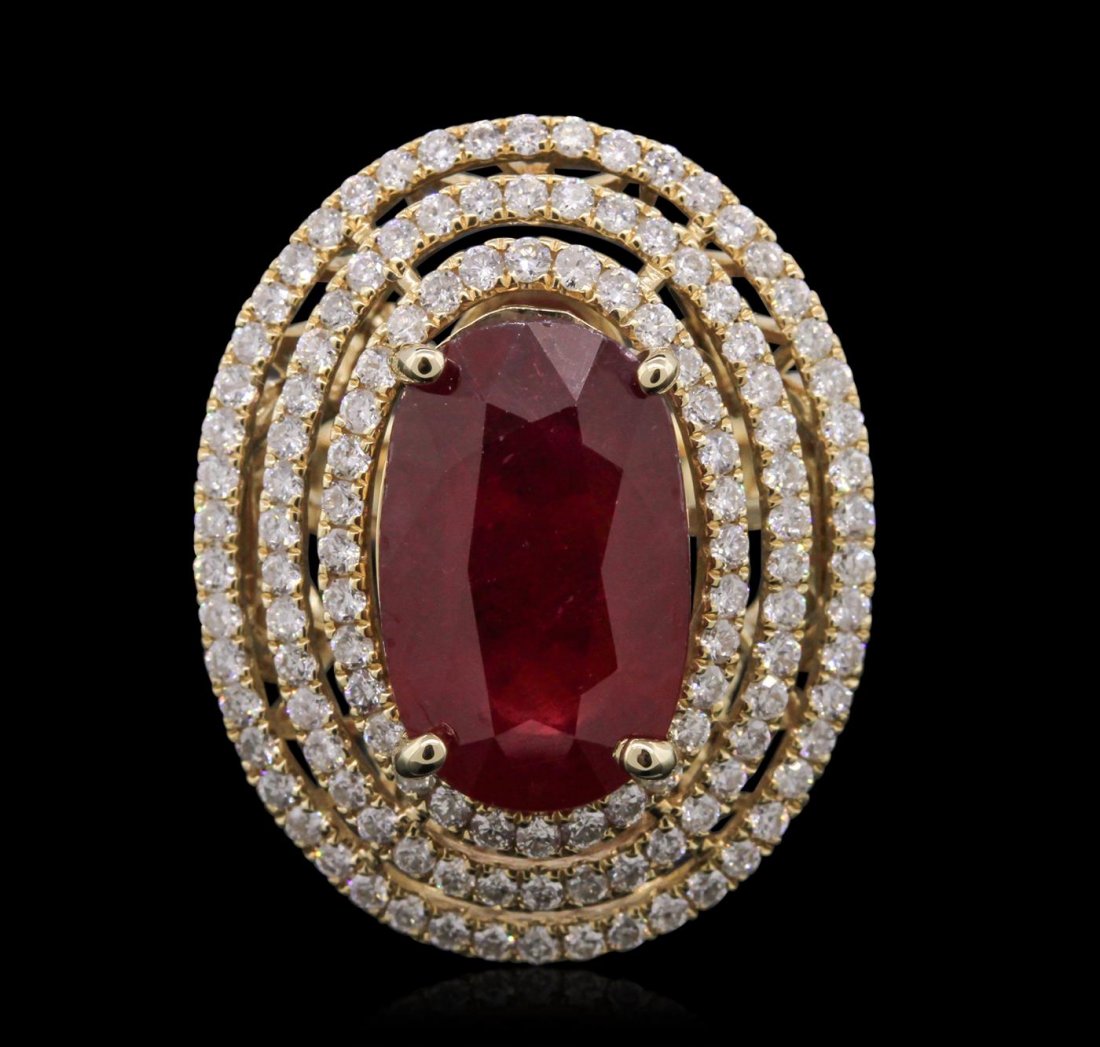 14KT Yellow Gold 8.09ct Ruby and Diamond Ring: One electronically tested 14KT yellow gold Ladies combination cast & assembled ring with a bright polish finish. Condition is new. Identified with markings of "14K". Containing: One prong set oval mod