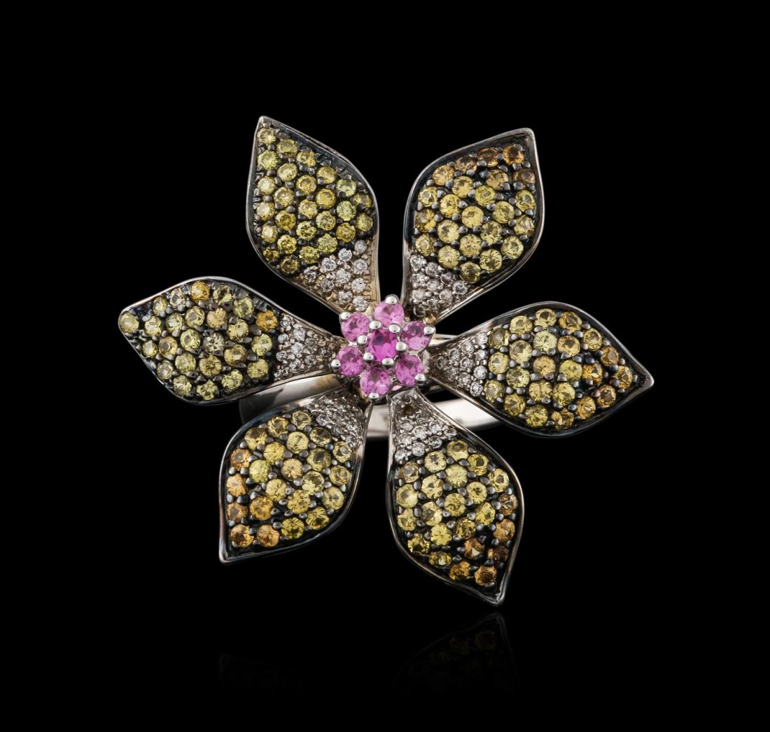 14KT White Gold 6.28ctw Multicolor Sapphire and Diamond: One electronically tested 14KT white gold ladies cast sapphire and diamond ring with a bright polish finish. Identified with markings of "14K". Condition is new. Containing: Seven prong set round modi