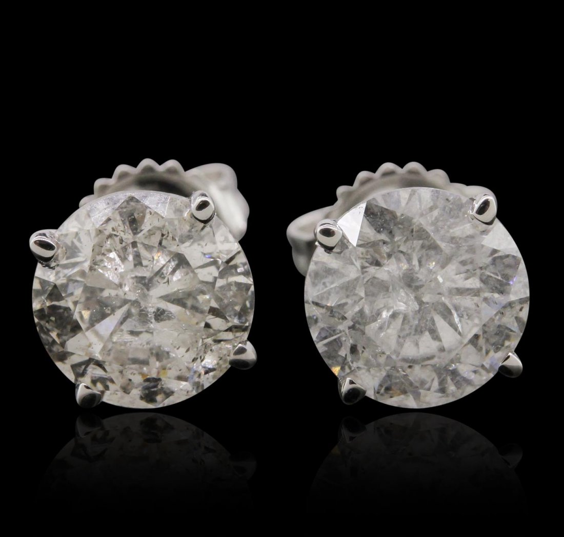 14KT White Gold 4.10ctw Diamond Stud Earrings: One electronically tested 14KT white gold Ladies cast stud earrings with friction posts with a bright polish finish. Condition is new. Identified with markings of "14K". Containing: One prong set roun