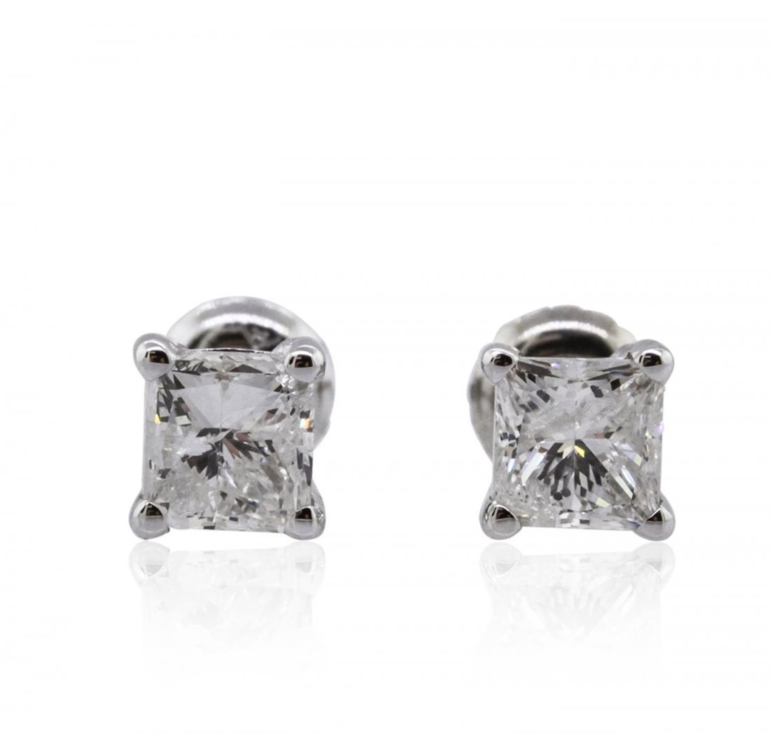 14KT White Gold 1.52ctw Diamond Solitaire Earrings: One pair electronically tested 14KT white gold cast & assembled diamond solitaire earrings with screw backs. Bright polish finish. Condition is new, good workmanship. Containing: One prong set princes