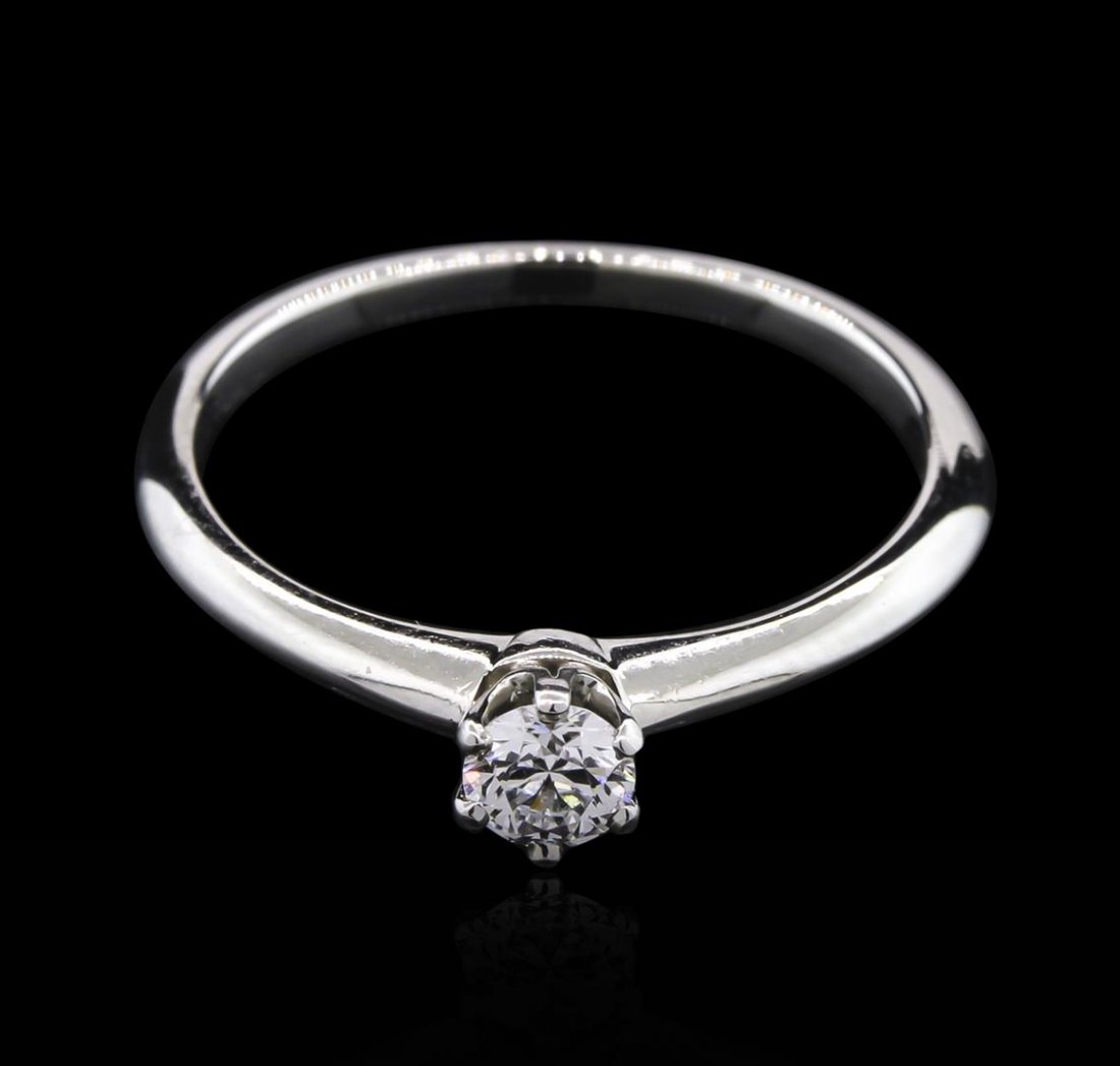 Tiffany & Co. 0.19ct Diamond Solitaire Ring - Platinum: One platinum Tiffany & Co. diamond solitaire ring. Diamond Info - Shape: Round. Diamond size: 0.19ct. Clarity: VS-2. Color: I. The total weight of the ring is 2.70 grams. Comes with Tiffany & Co. inne