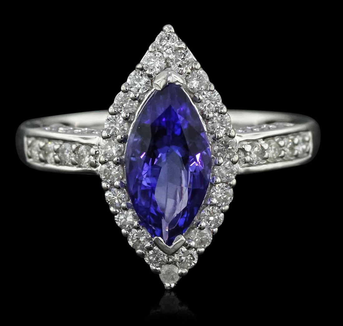 14KT White Gold 2.13ct Tanzanite and Diamond Ring: One electronically tested 14KT white gold Ladies combination cast & assembled ring with a bright polish finish. Condition is new. Identified with markings of "14K". Containing: One prong set marquise 