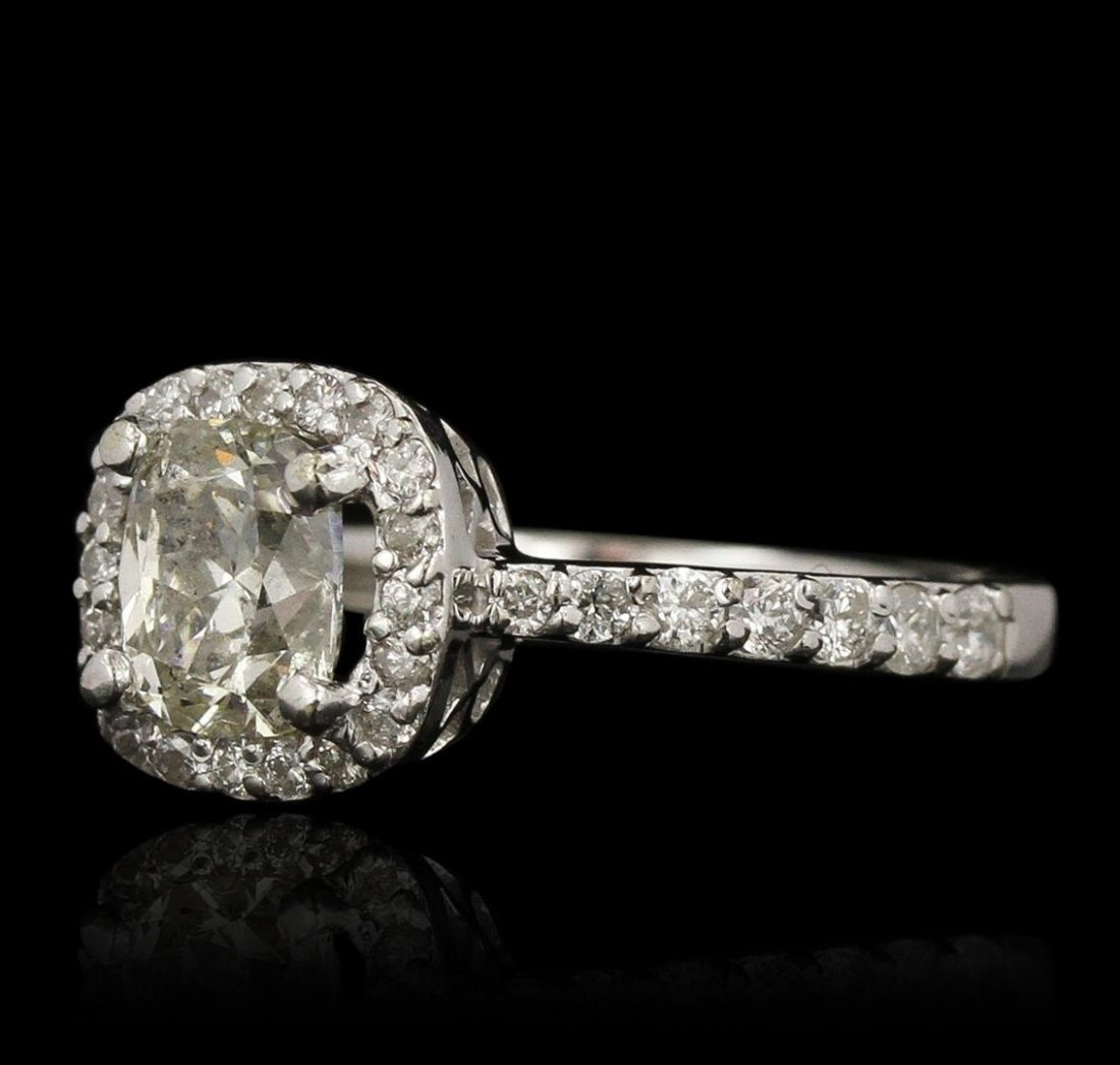 14KT White Gold 2.47ctw Diamond Ring: One electronically tested 14KT white gold ladies cast diamond ring with a bright polish finish. Condition is new, good workmanship. The featured diamond is set within a diamond bezel, supported by dia