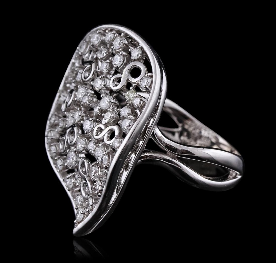 14KT White Gold 0.88ctw Diamond Ring: One electronically tested 14KT white gold Ladies combination cast & assembled ring with a bright polish finish. Condition is new. Identified with markings of "14K". Containing: Forty-Four prong set ro
