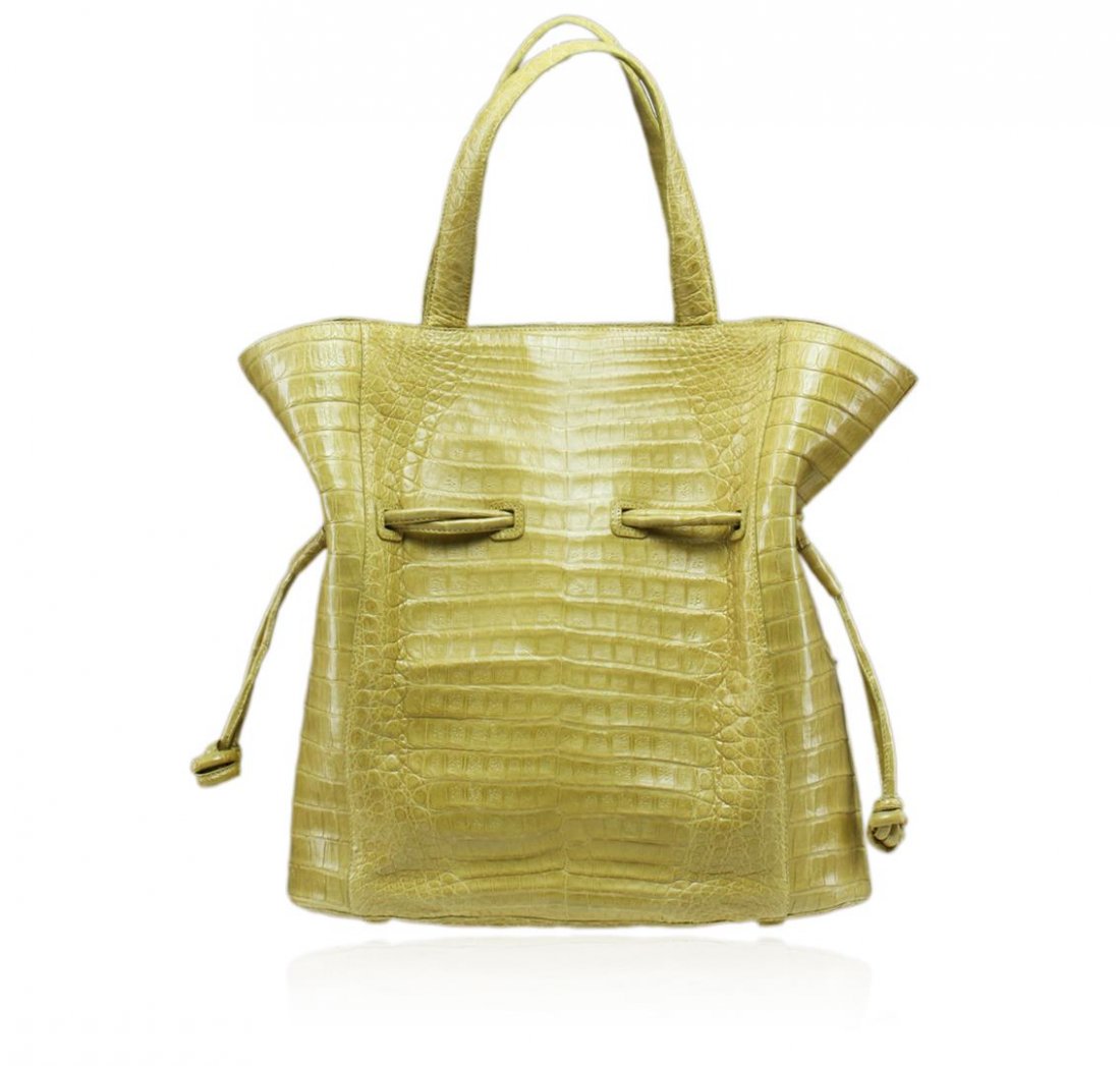 Nancy Gonzalez Lime Matte Crocodile Tote: One Nancy Gonzalez Lime Matte Crocodile Tote. This roomy tote epitomizes everyday sophistication and makes a perfect everyday bag, large enough to hold all your essentials in style. The classic tote s