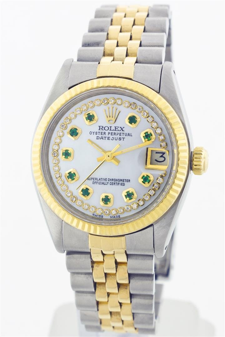 Rolex Two-Tone Diamond and Emerald DateJust Ladies: One Ladies Two Tone Rolex Datejust Polished, Serviced & Electronically Tested, 14K Yellow Gold & Stainless Steel Case:26mm, 14K Yellow Gold Crown, Custom Bezel: 14K Yellow Gold Fluted Bezel. Custom Cr