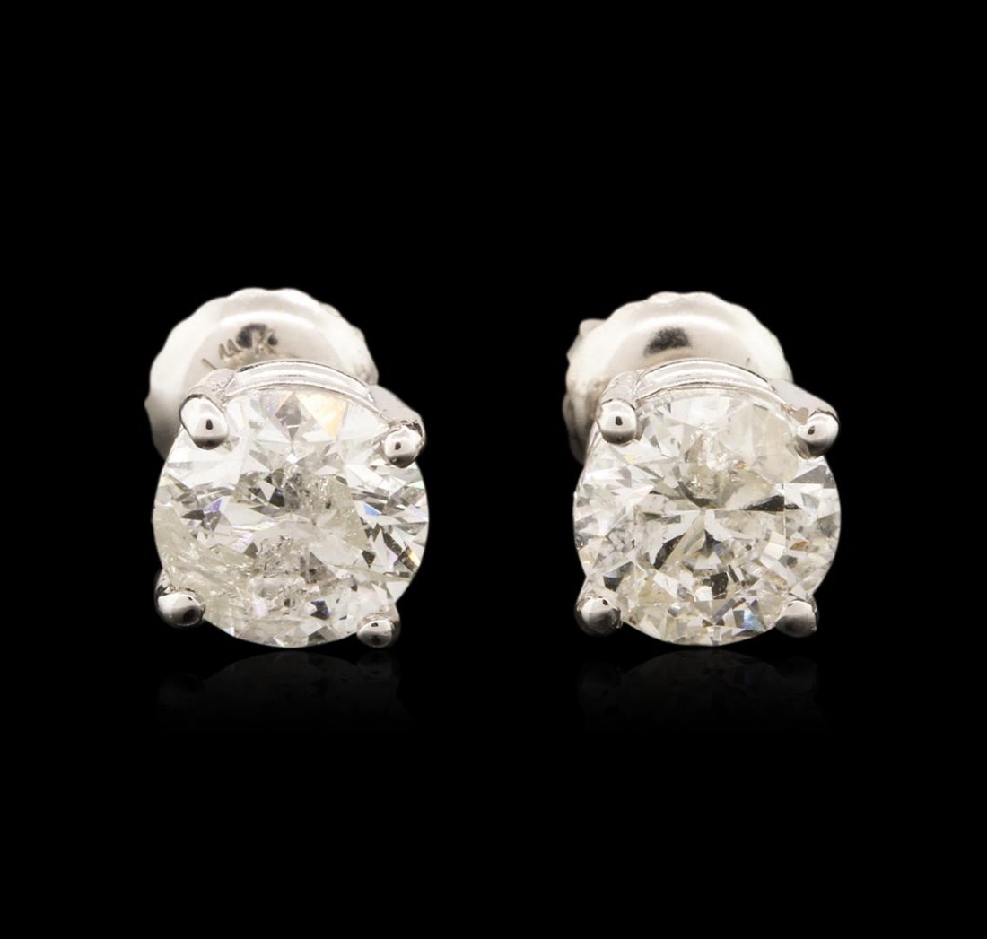 14KT White Gold 1.60ctw Diamond Stud Earrings: One pair electronically tested 14KT white gold ladies cast diamond stud earrings with French screw backs with a bright polish finish. Condition is new. Containing: One prong set round brilliant cut di