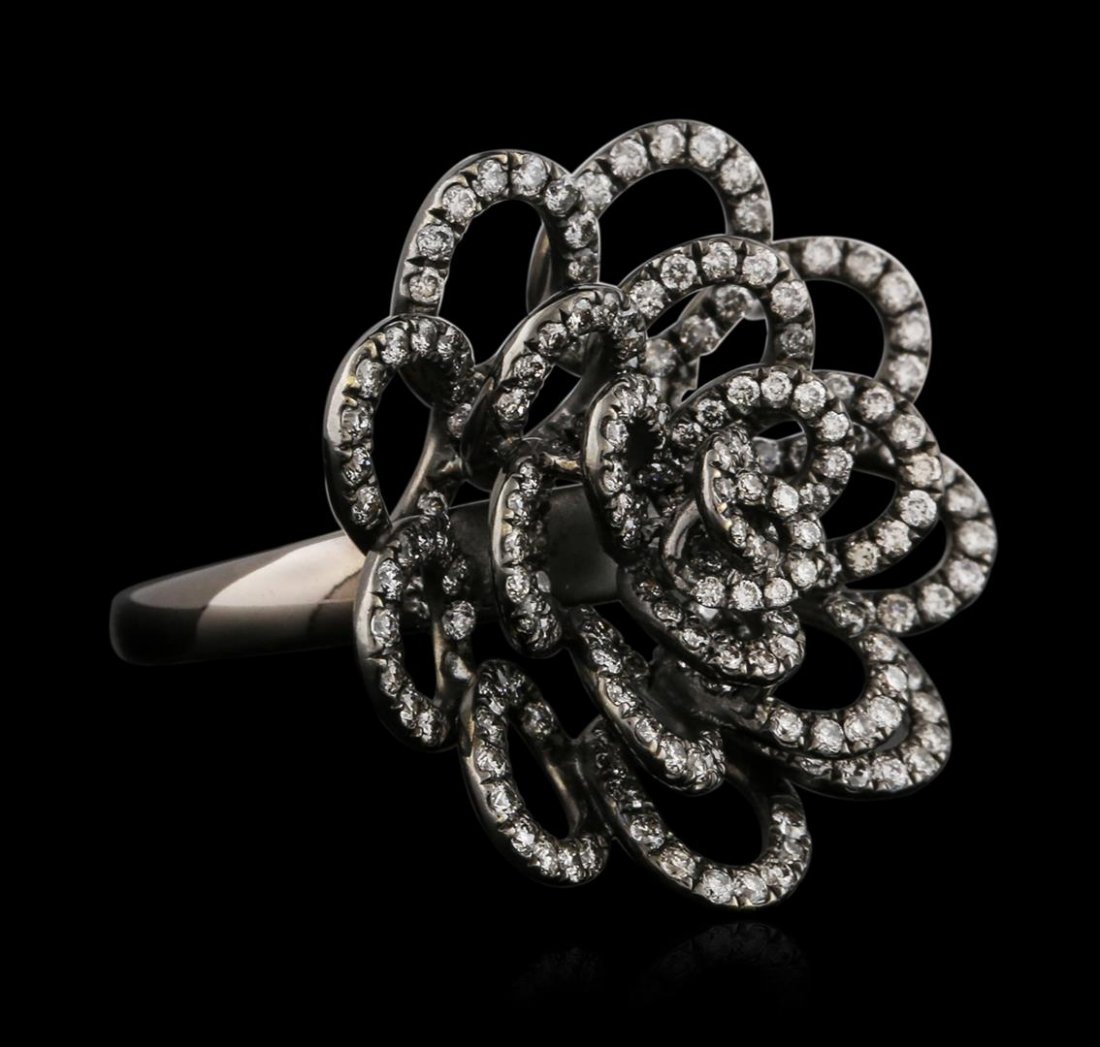 18KT Black Gold 1.44ctw Diamond Ring: One electronically tested 18KT black gold ladies cast diamond ring with a bright polish finish. Identified with markings of "18K". Condition is new. Containing: One Hundred Forty-Four prong set round 