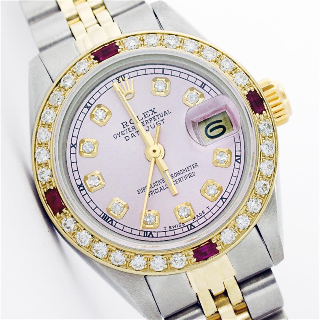 Rolex Two Tone Diamond and Ruby DateJust Ladies Watch: One Ladies Two Tone Rolex Datejust Polished, Serviced & Electronically Tested, 14K Yellow Gold & Stainless Steel Case:26mm, 14K Yellow Gold Crown, Custom Bezel: 18K Yellow Gold Ruby Beadset Diamond Be