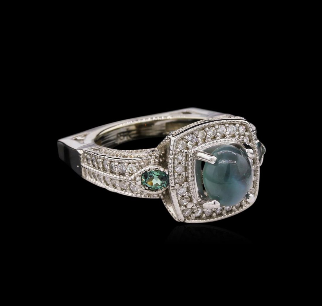 2.66ct Alexandrite and Diamond Ring - 18KT White Gold: One 18KT White Gold ring. 12.42 GR. Containing: 2.66 CTS oval shape Brazilian cats eye alexandrite. 1.00 CTS round brilliant cut diamonds. 0.10 CTS round cut alexandrite. All SI Clarity, G-H Color Fin