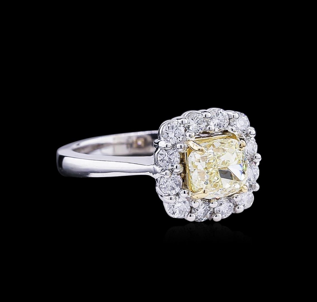 2.11ctw Fancy Light Yellow Diamond Ring - 14KT Two-Tone: One electronically tested 14KT white and yellow gold lady's combination cast & assembled wedding ring with a basket halo with a bright polish finish. The featured lady's ring has a shank measuring 2.7