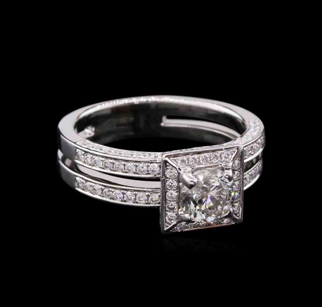 1.63ctw Diamond Ring - 14KT White Gold: One electronically tested 14KT white lady's combination cast & assembled split shank square halo wedding ring with a bright polish finish. The featured lady's ring has a shank measuring 4.60 millimete