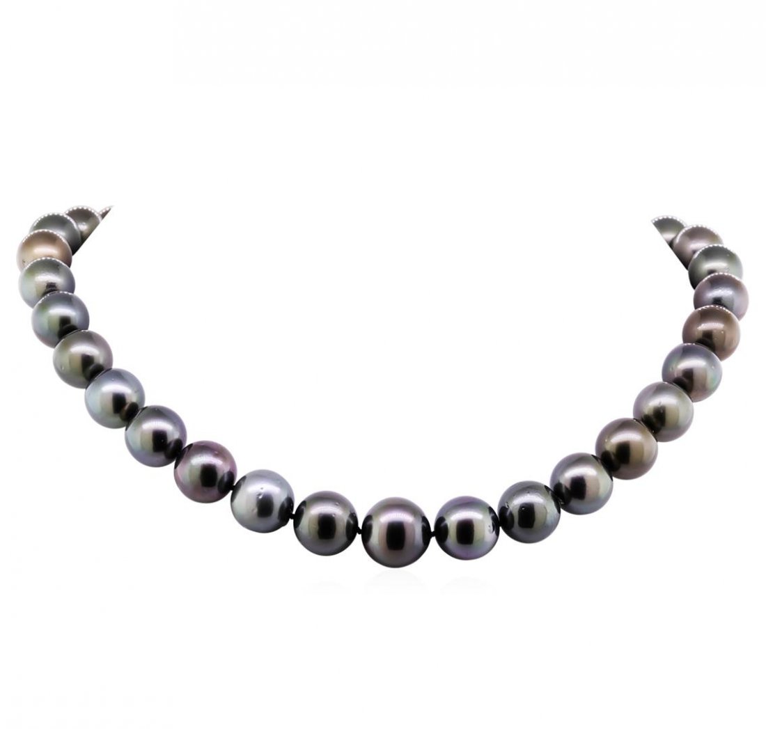 0.10ctw Tahitian Cultured Pearl and Diamond Necklace: One graduated single strand pearl necklace 18.5" princess length, knotted with a tongue clasp & foldover safety containing 33 Tahitian pearls, 12.1mm in size to 15.6mm in size. The pearls are black in