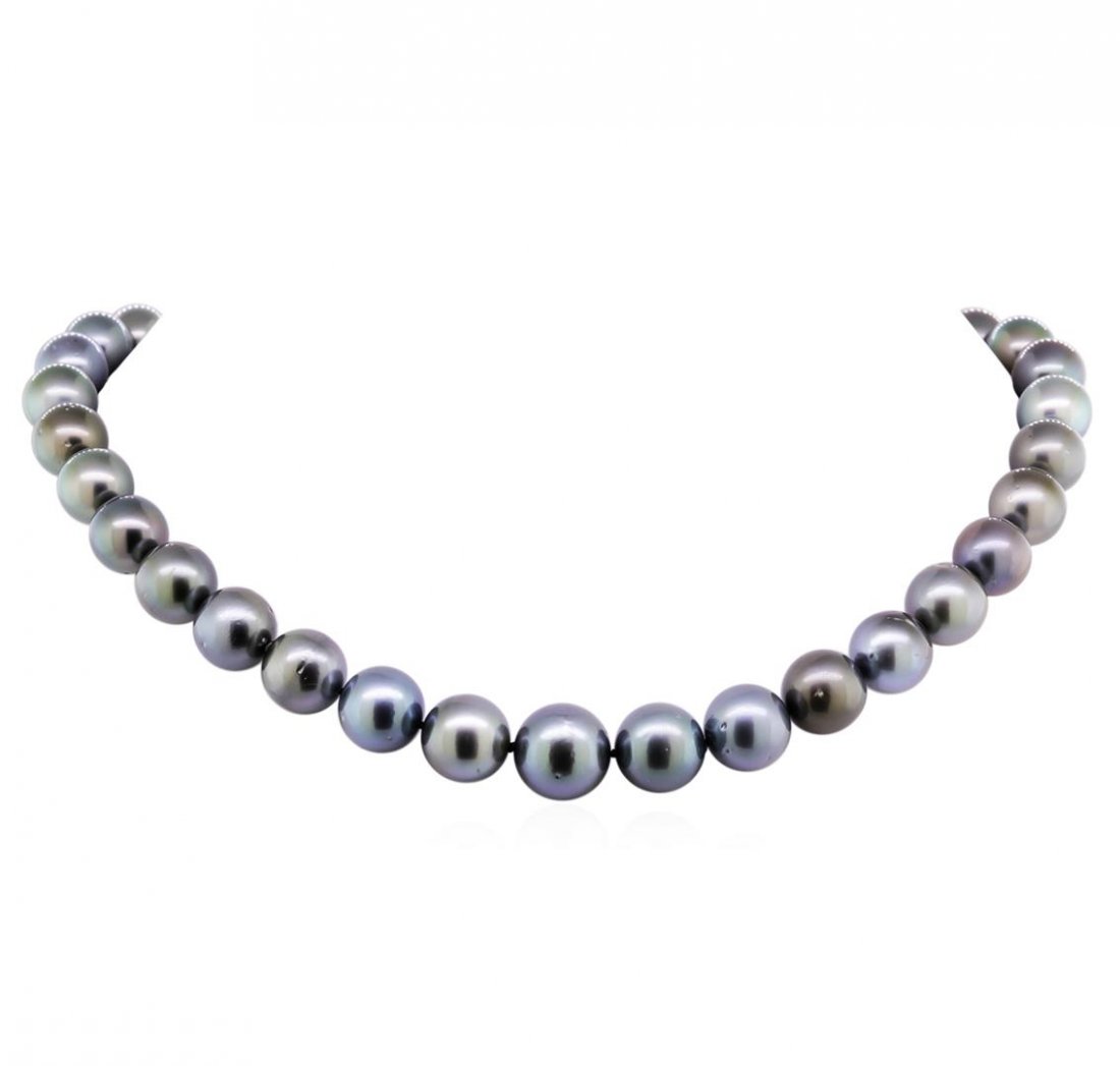 0.10ctw Tahitian Cultured Pearl and Diamond Necklace: One graduated single strand pearl necklace 18.0" princess length, knotted with a tongue clasp containing 35 Tahitian pearls, 10.9mm in size to 14.7mm in size. The pearls are black in color, green over