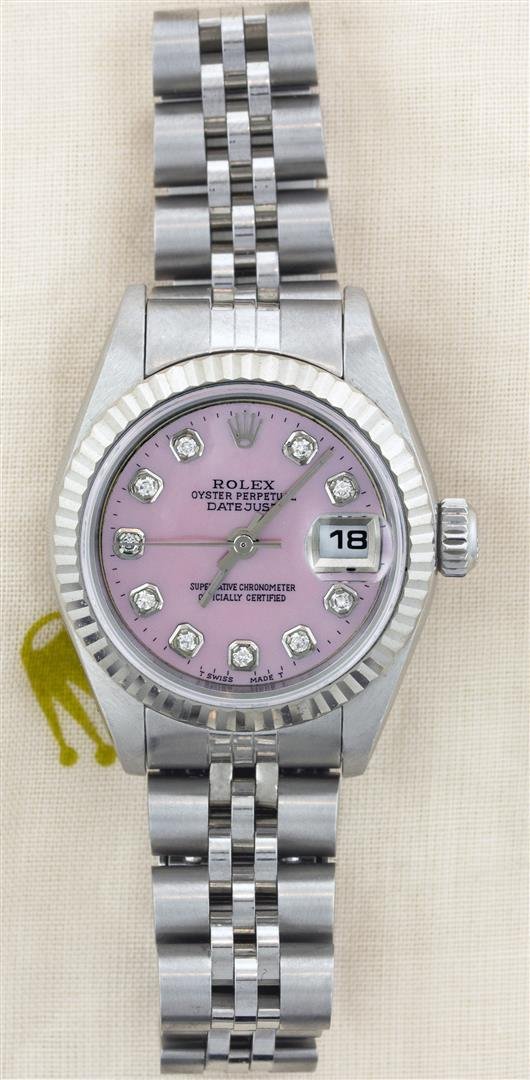 Rolex Stainless Steel Diamond DateJust Ladies Watch: One Ladies Rolex Datejust Polished Bright with Satin Finish, Serviced & Electronically Tested, Stainless Steel Case:26mm, Stainless Steel Crown, Custom Bezel: 14K White Gold Fluted. Custom Crystal: Ac