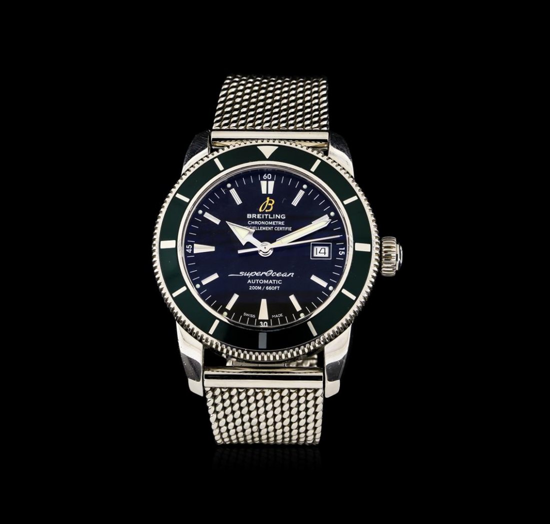 Breitling Super Ocean Men's Watch: Stainless steel case and stainless steel mesh bracelet. Unidirectional stainless steel bezel with black ion-plated top ring. Silver dial with luminous hands and index hour markers. Minute markers arou