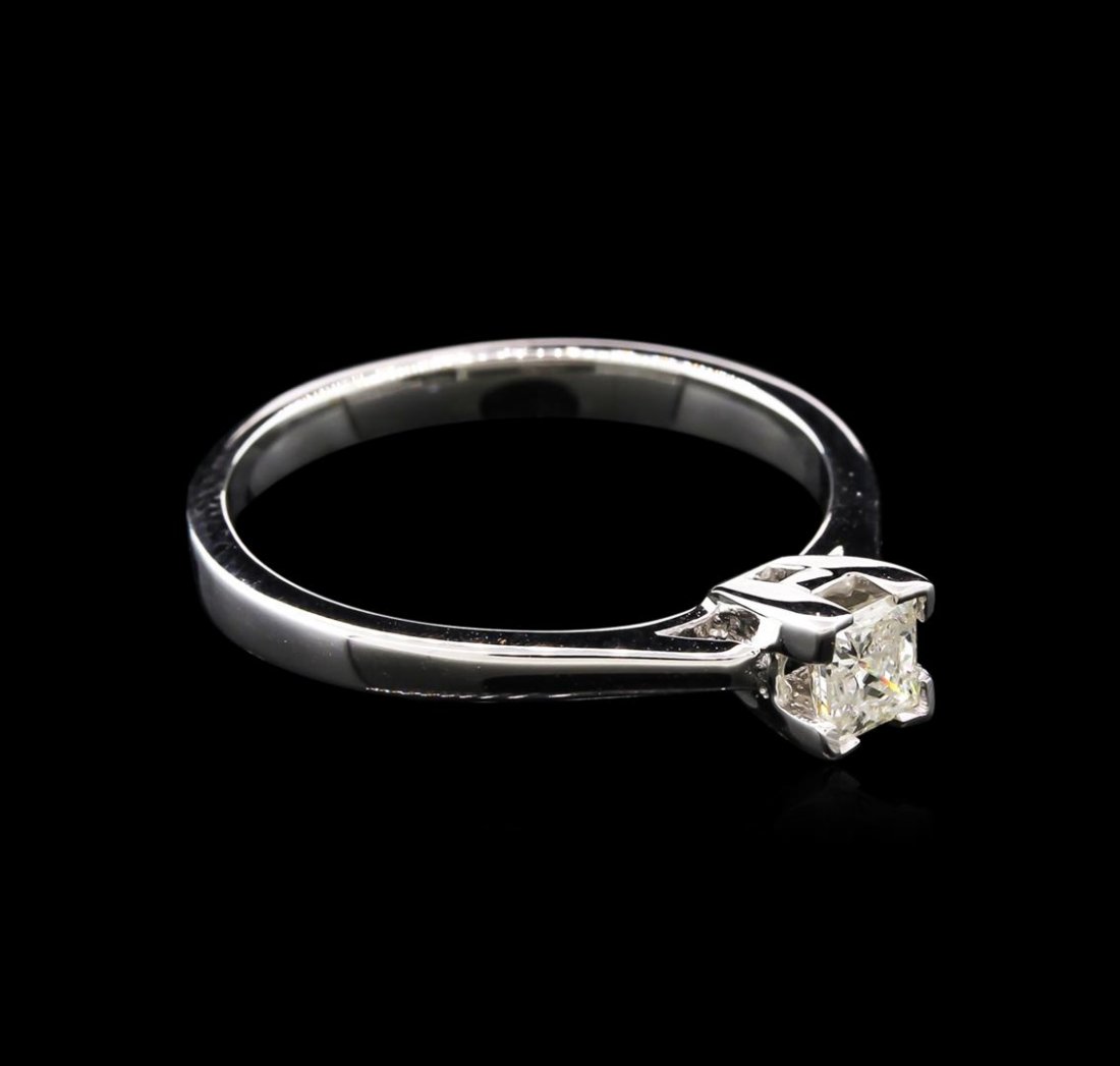 0.30ct Diamond Solitaire Ring - 14KT White Gold: One solitaire ring featuring: 14KT white gold weighing 2.45 grams containing one diamond with a total weight of 0.30ct.