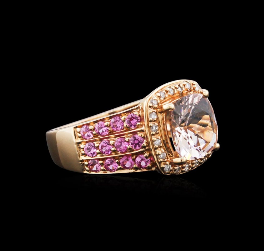 14KT Rose Gold 1.73ct Morganite, Pink Sapphire and: One ring featuring: 14KT rose gold weighing 3.25 grams containing one morganite center stone with a total weight of 1.73ct, 24 pink sapphires with a total weight of 0.71ct, and 20 round diamonds with 