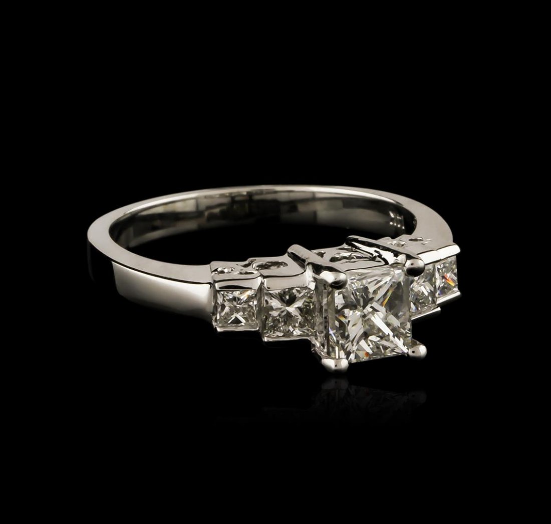 14KT White Gold 1.19 ctw Diamond Ring: One electronically tested 14KT white gold ladies cast diamond engagement ring with a bright polish finish. Identified with markings of "14K". Condition is new. Containing: One prong set princess cut d