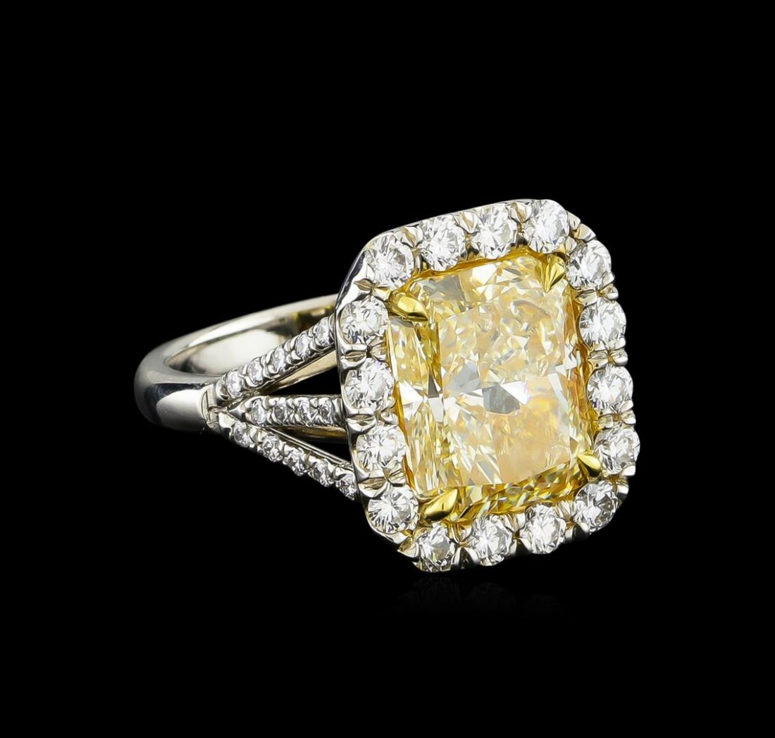 EGL USA Cert 6.79 ctw VVS1 Fancy Yellow Diamond Ring -: One ring featuring: platinum consisting of one cut cornered rectangular modified brilliant diamond measuring 11.00 x 9.00 x 6.02mm weighing 5.53ct. Diamond is fancy intense yellow in color and VVS1 in